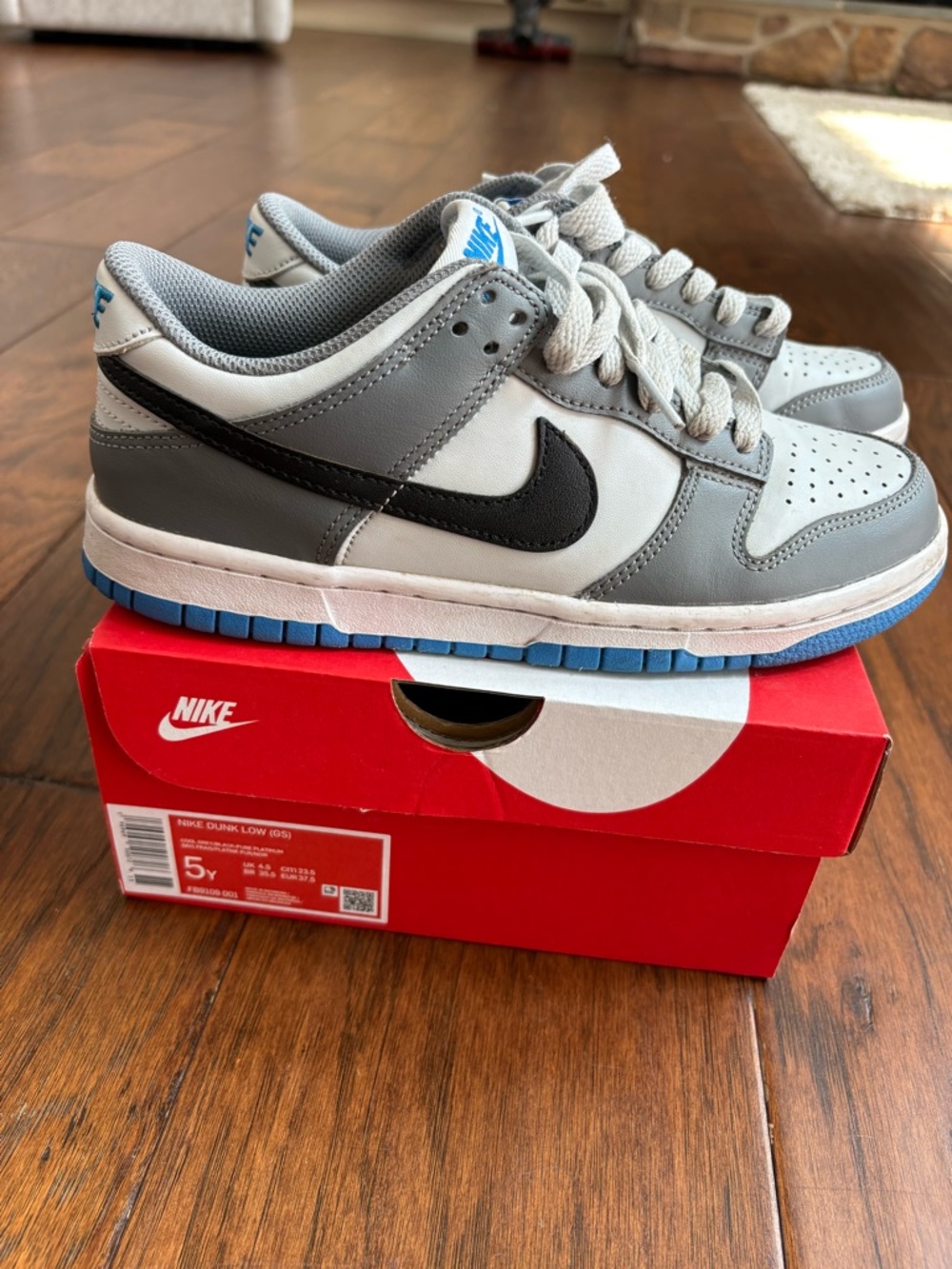Nike Low-Top Sneakers in Gray, White & Black with Blue Sole